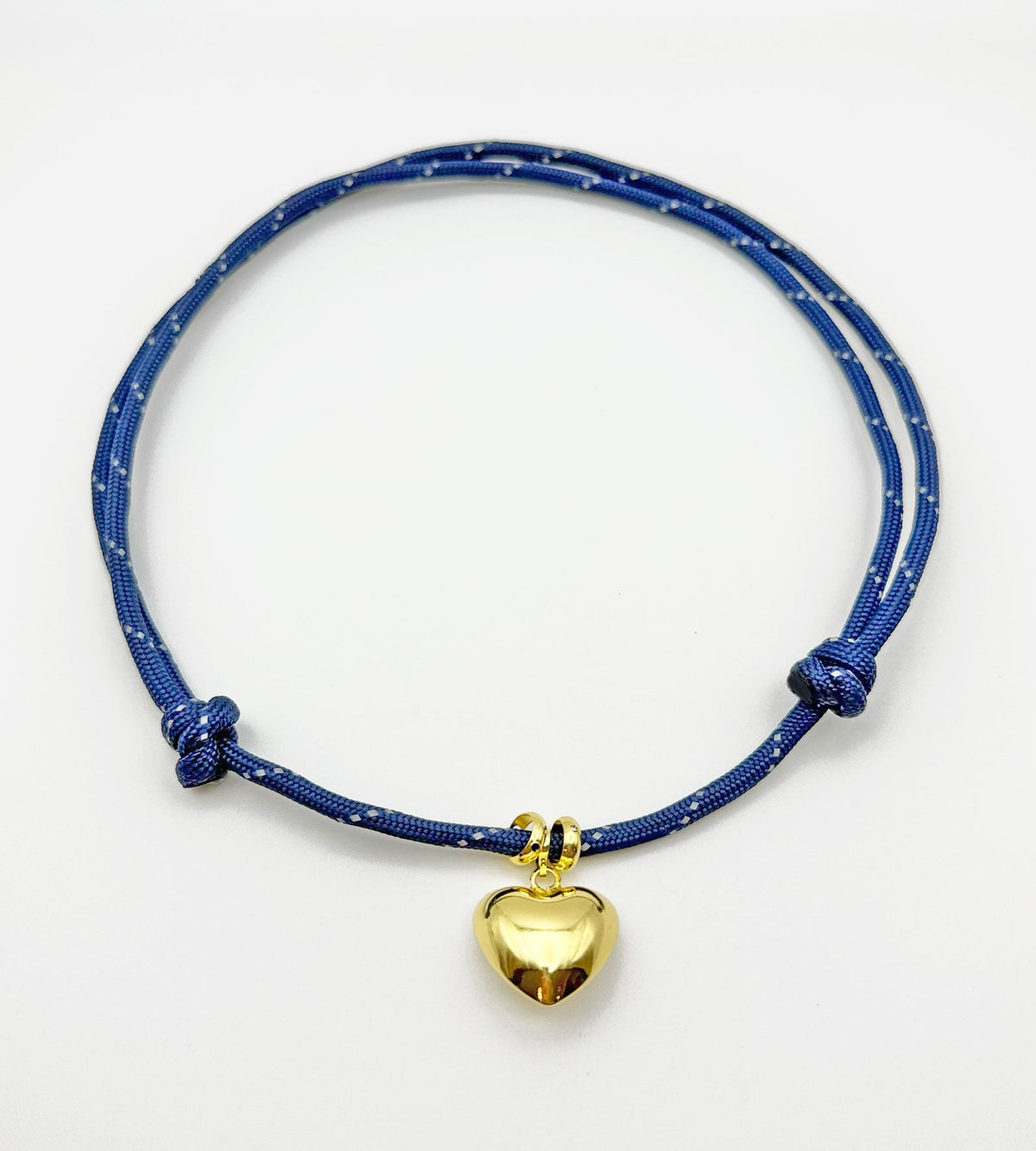 Isla Sol J'adore Necklace, navy paracord with a gold puffy heart charm and sliding knots