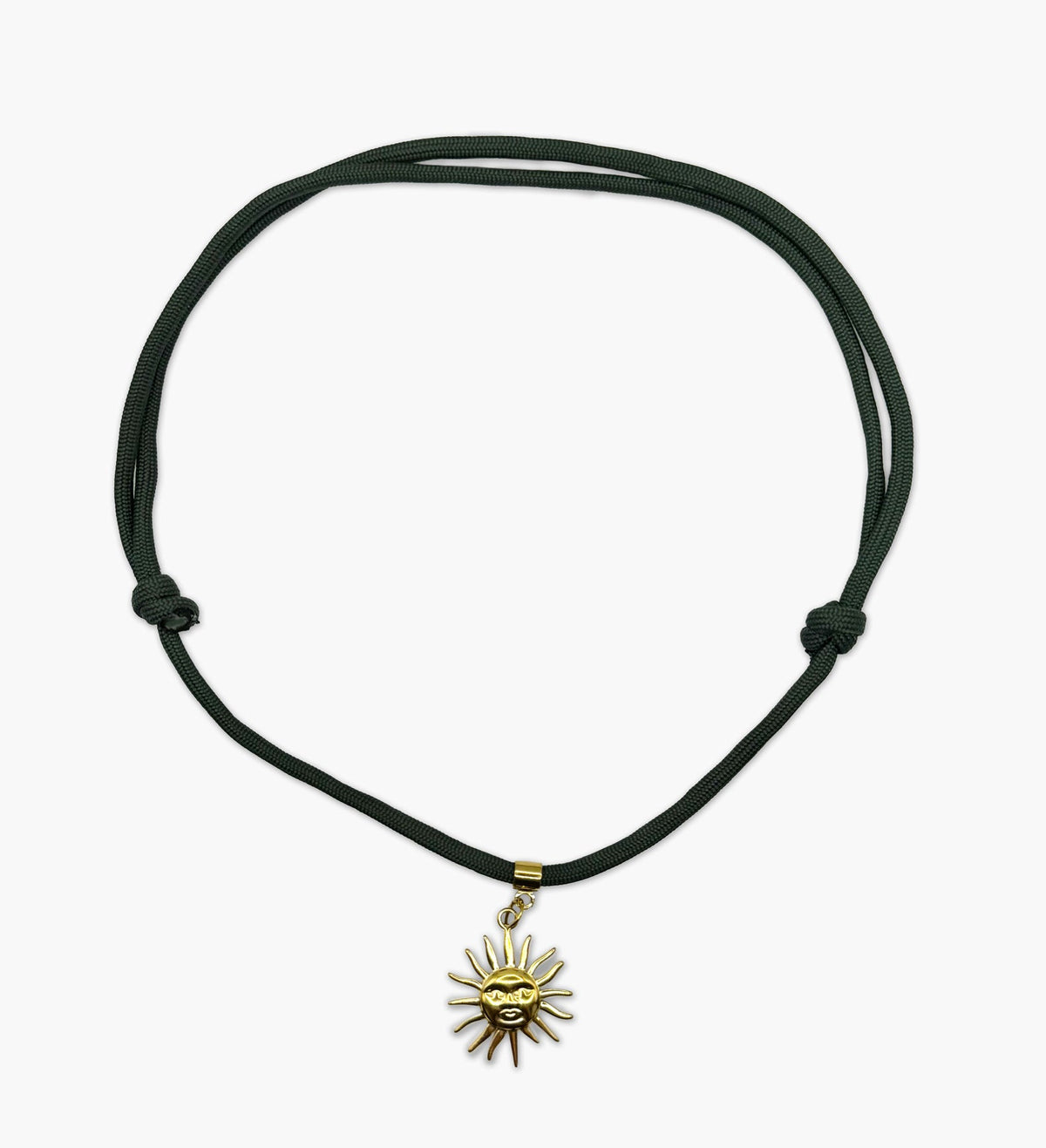 Isla Sol Soleil Vert Necklace, deep green paracord with a gold sun charm and adjustable sliding knots