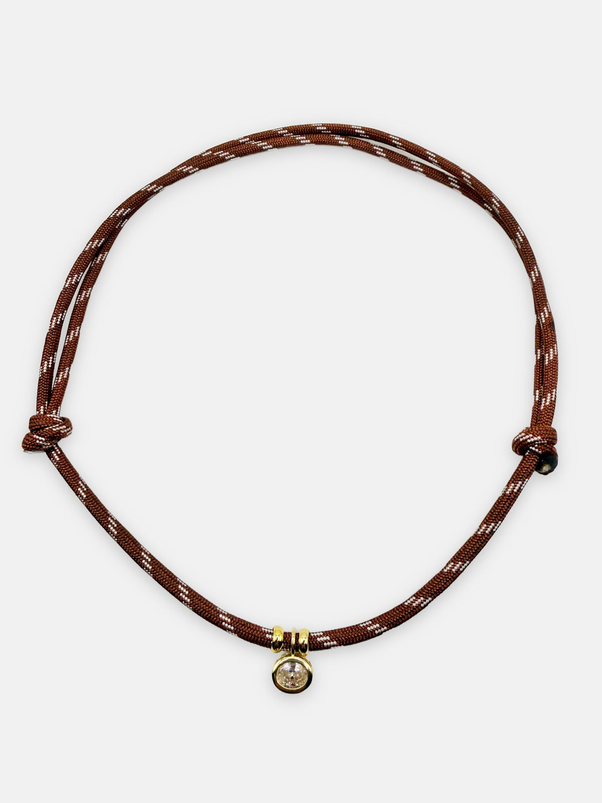 Isla Sol Summit Necklace in Chestnut brown paracord with gold bezel-set rhinestone charm